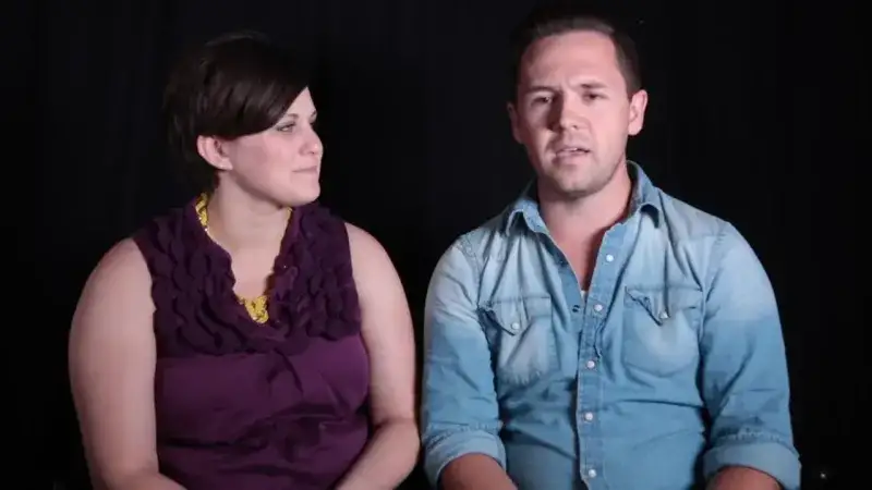 Josh & Diana's being interviewed with a black background